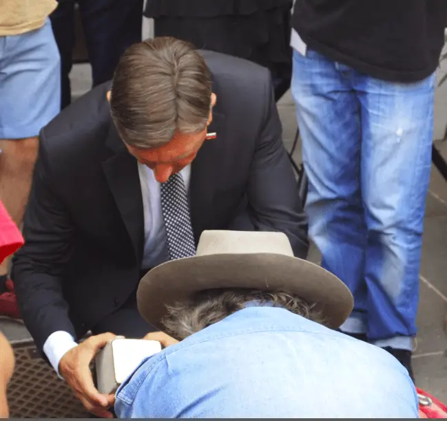 Pahor and Denniger lay stone.PNG