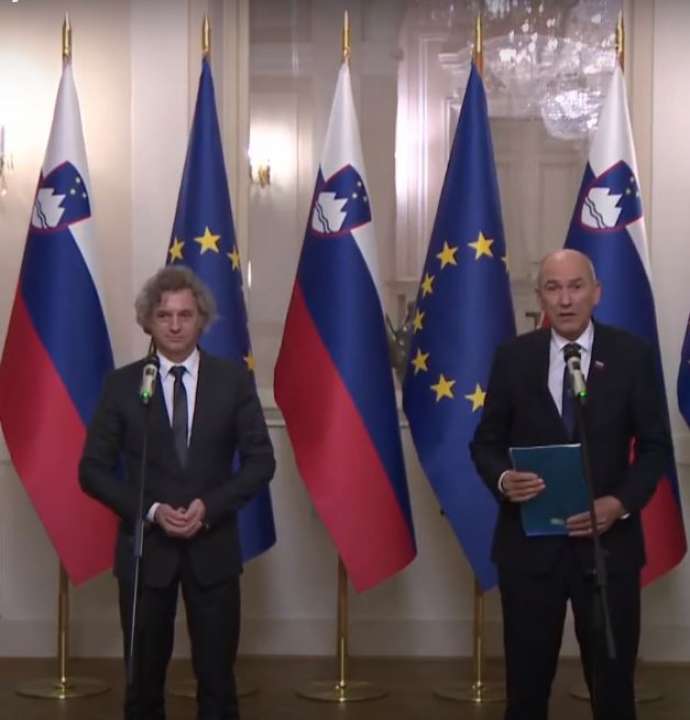New PM Golob, left, Ex-PM Janša, right