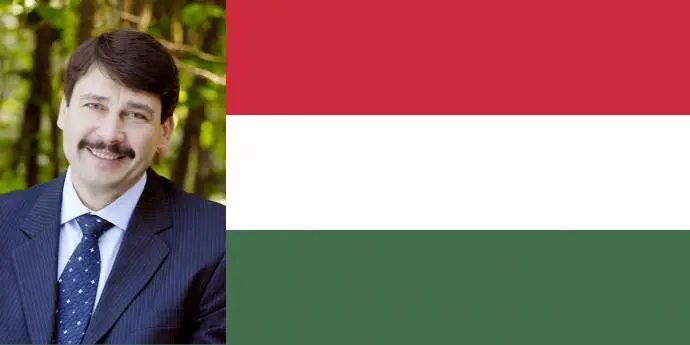 Hungarian President Janos Ader and the nation&#039;s flag
