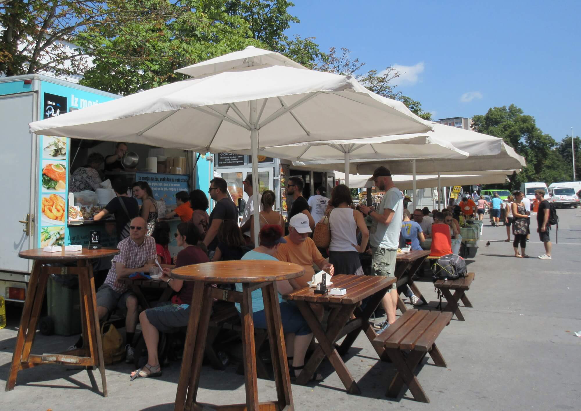 jl flanner august 2019 ljubljana market foodstalls.jpg