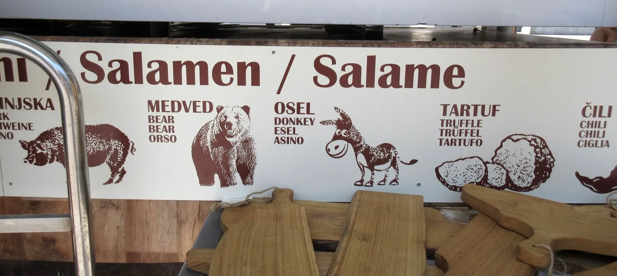 jl flanner august 2019 ljubljana market salami bear donkey.jpg