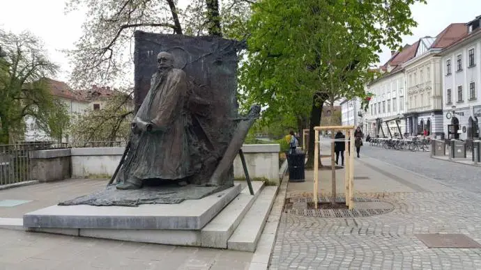 Statue of Ivan Hribar, where he jumped into the river