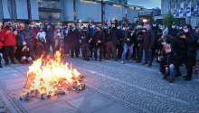 Protesters Light May Day Bonfire in Front of Parliament