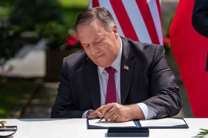 US Secretary of State Mike Pompeo signs the declaration