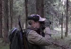 A hunter looking for a bear