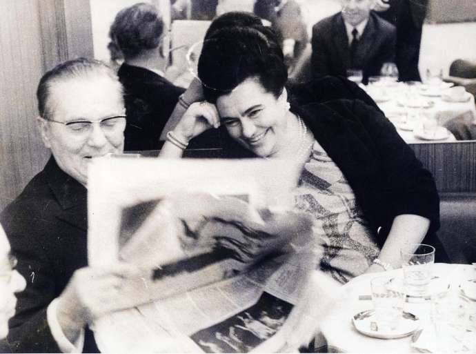 Josip and Jovanka Broz reading &quot;Delo&quot; in Ljubljana&#039;s Hotel Slon, 1969