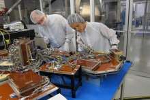 This is actually a picture of  NEMO-HD, the microsatellite, during integration. This will go into space along with Trisat, the nanosatellite