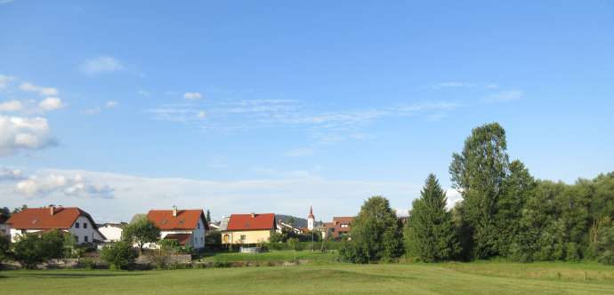 A view of St Nicholas Church, Logatec, in the summer