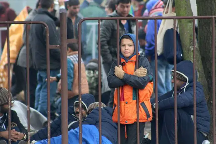 A young refugee boy in Dobova, Slovenia